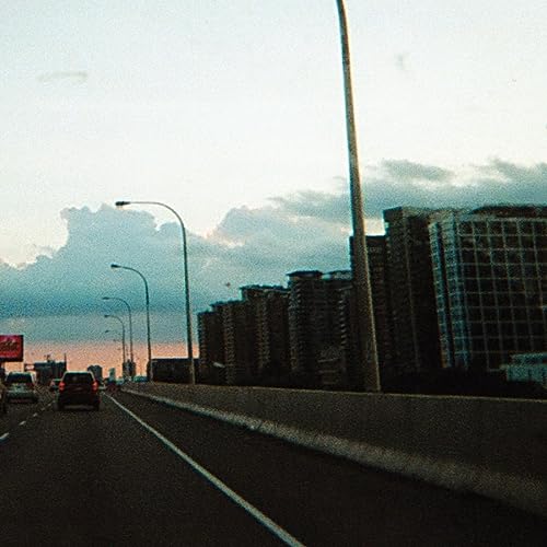 Vinyl record cover depicting a cloudy sky over a city street.