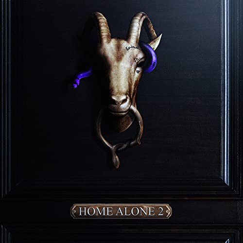 Black album cover featuring a taxidermied goat head with blue eyes.