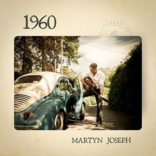 CD cover for Martyn Joseph’s “1960” featuring a man with a guitar.