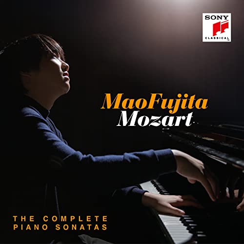 Pianist Mao Fujita at a grand piano, album cover for Mozart sonatas.