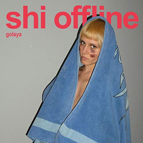 The alt text for the image is: "Album cover with person wrapped in blue towel, bruises on their face."