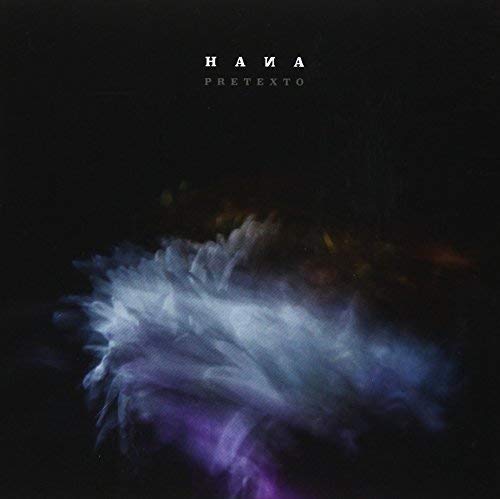 CD cover for “Pretexto” with abstract smoky purple and blue imagery.
