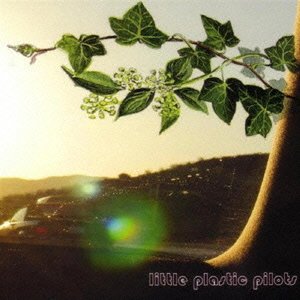 CD cover: ivy branch over a landscape with text “Little plastic pilots”.