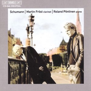 CD cover with two men leaning on a railing against a cityscape background.