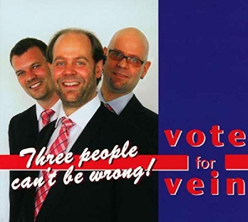 "Album cover featuring three men in suits with 'vote for vein' text."