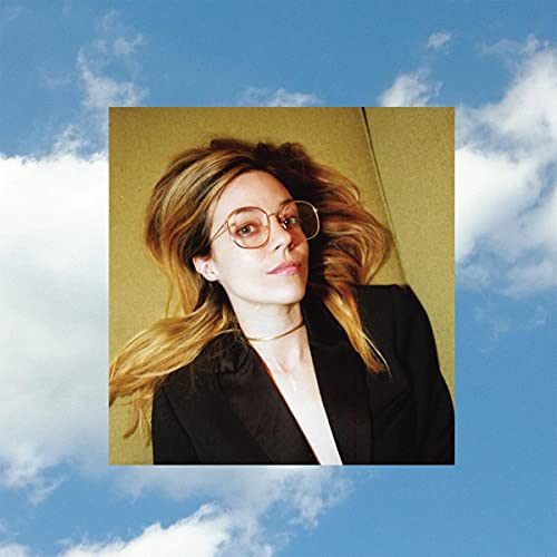 Anna Fox Rochinski album cover featuring a woman with wavy hair and glasses.
