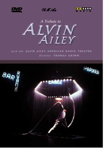 DVD cover: dancer in spotlight under neon signs on dark background, purple title section above.