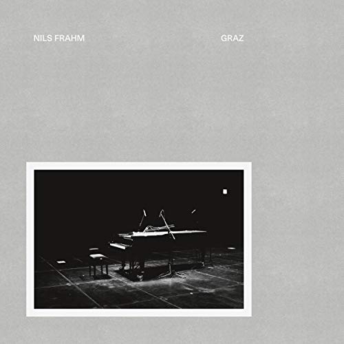 Nils Frahm's "Graz" vinyl cover: a piano in a dark, empty concert hall.