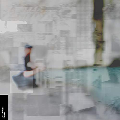 Abstract, blurry grey and white composition with a dark silhouette and text in corner.