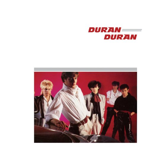"Duran Duran album cover featuring the band members posing against a red background."