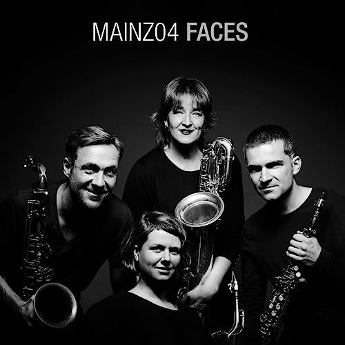 Black and white photo of four people with saxophones, album cover.