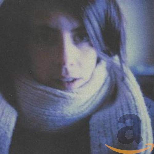 CD cover featuring a close-up portrait of a woman with a scarf.