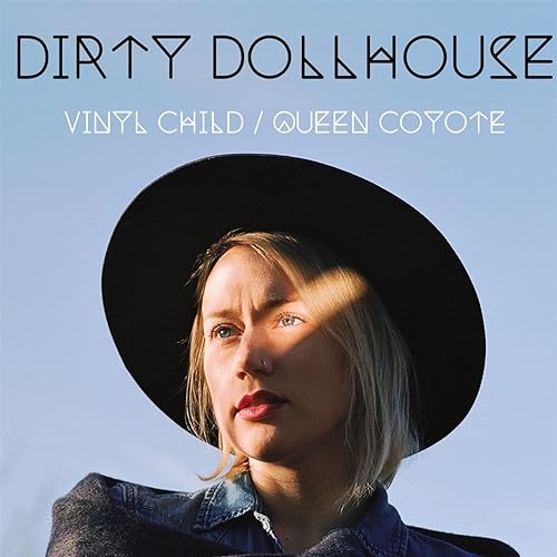 Album cover featuring a woman in a black hat, facing forward.