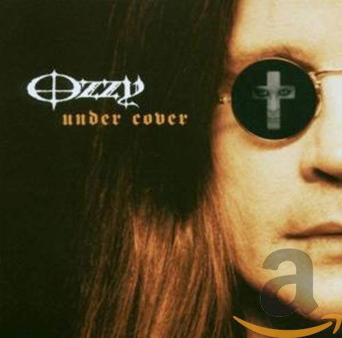 Ozzy Osbourne album cover, close-up of face with sunglasses and cross.