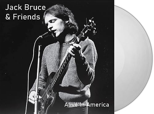 Jack Bruce album cover with a photo of him playing bass and clear vinyl record.