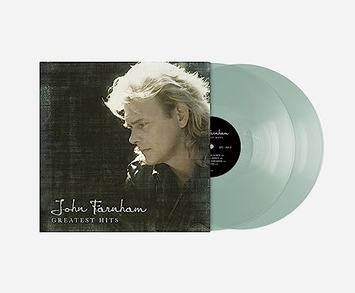 John Farnham’s “Greatest Hits” vinyl record in a bottle green color.
