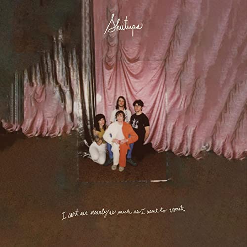 Album cover featuring four people posing in front of pink curtains.
