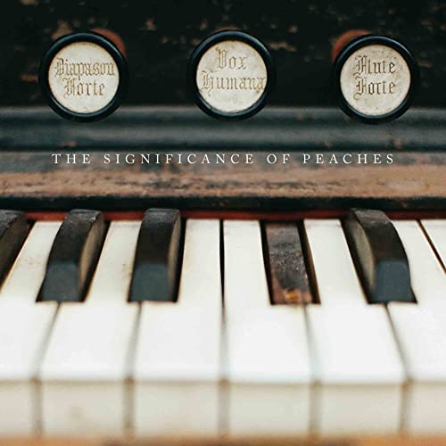 Piano keys and organ stops with album title "The Significance Of Peaches".