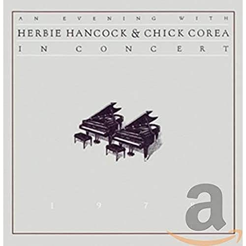 Album cover for Herbie Hancock & Chick Corea featuring two grand pianos.