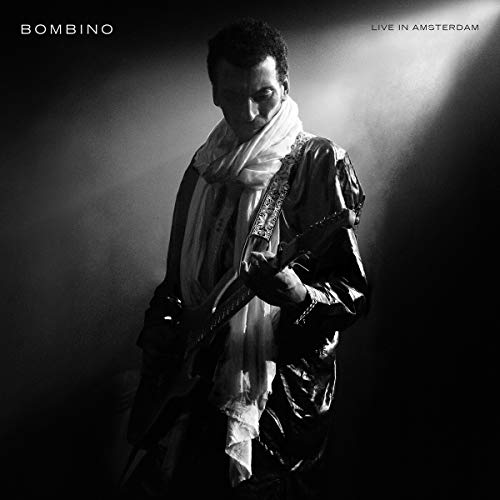 Black and white album cover featuring a musician with a guitar.