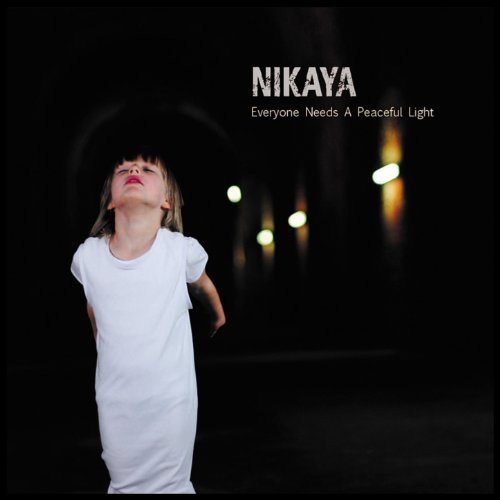 CD cover: girl looking up in a tunnel, text "Nikaya".