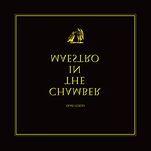 "Black vinyl record cover with yellow text and a bird logo, upside-down text."