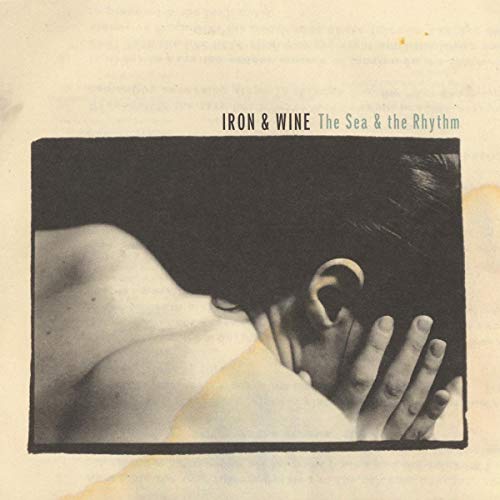 Iron & Wine album cover: black and white photo of a person’s head.