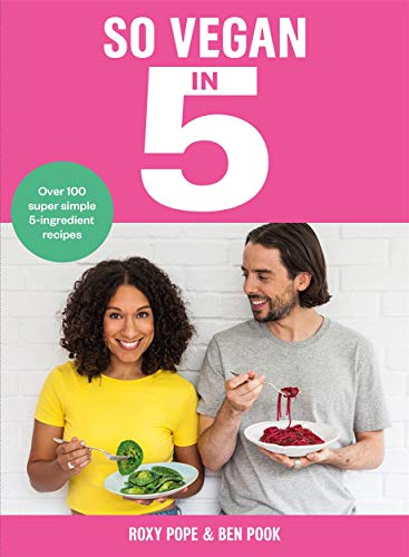 "Vegan cookbook cover featuring a man and woman holding plates of food."