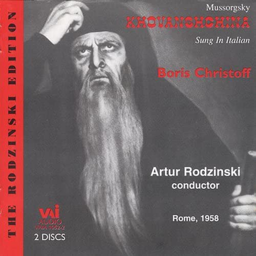 CDS albumLC album cover featuring a man with a long beard in dark robes.