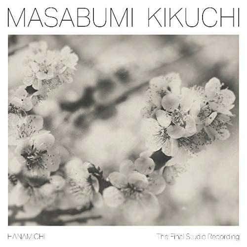 Album cover with black and white cherry blossoms and artist's name at the top.