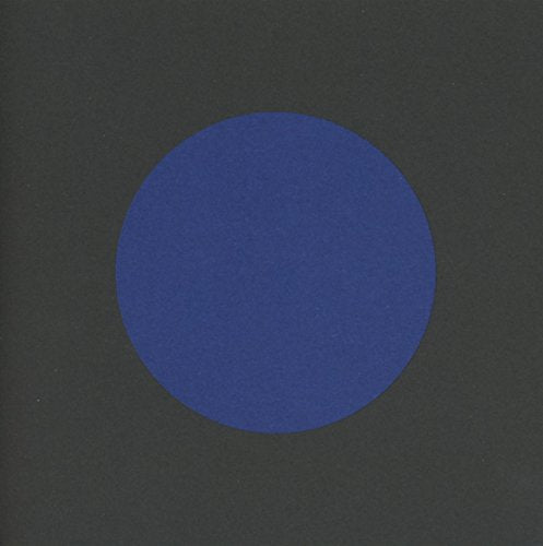 Dark gray square with a centered, solid blue circle.