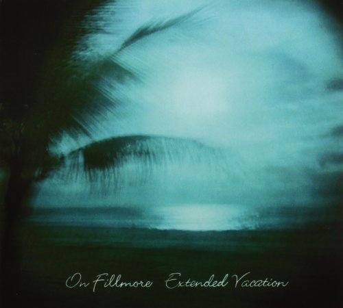Blurred teal album cover with palm trees and text: "On Fillmore Extended Vacation".