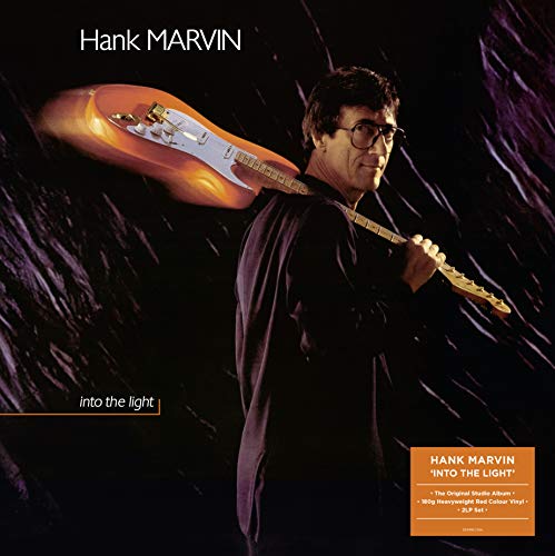 Hank Marvin album cover featuring the guitarist with his orange electric guitar.