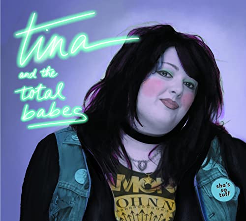 CD cover: woman with dark hair, denim vest, and graphic t-shirt.