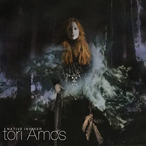 Tori Amos album cover, "Native Invader," featuring a woman in a forest.