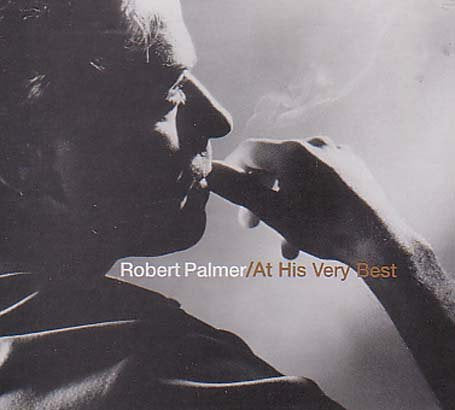 "Black and white CD cover with a man smoking, text 'Robert Palmer/At His Very Best'."