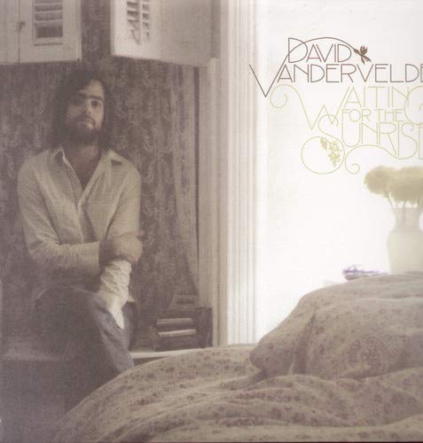 Album cover: David Vandervelde sitting by a window with flowers.