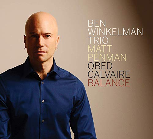 Bald man in blue shirt on beige background with multicolored text listing names and "Balance".