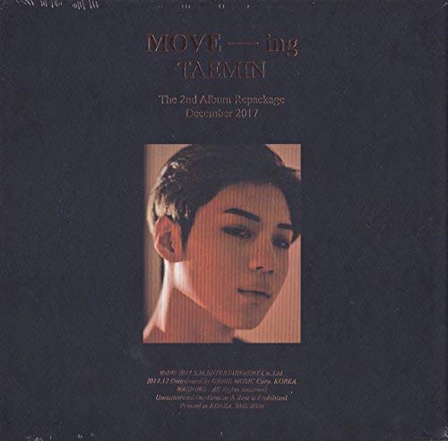 Taemin album cover: black background with portrait of a man.