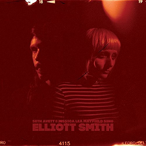 "Album cover featuring Seth Avett and Jessica Lea Mayfield in red-toned photograph."