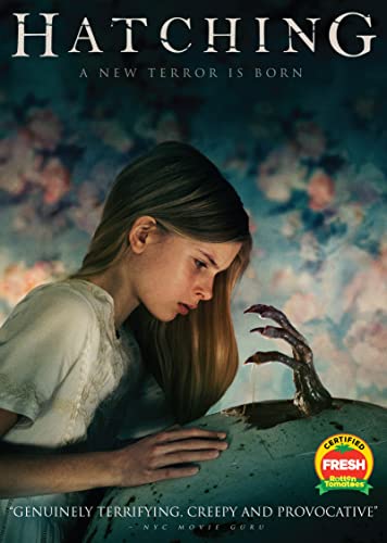 Blu-ray cover for horror film "Hatching," featuring a young girl and a clawed hand.