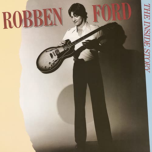 Robben Ford album cover: musician with guitar, yellow and blue background.