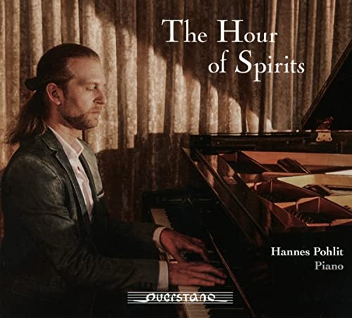 CD cover: Pianist Hannes Pohlit with a grand piano, moody lighting.