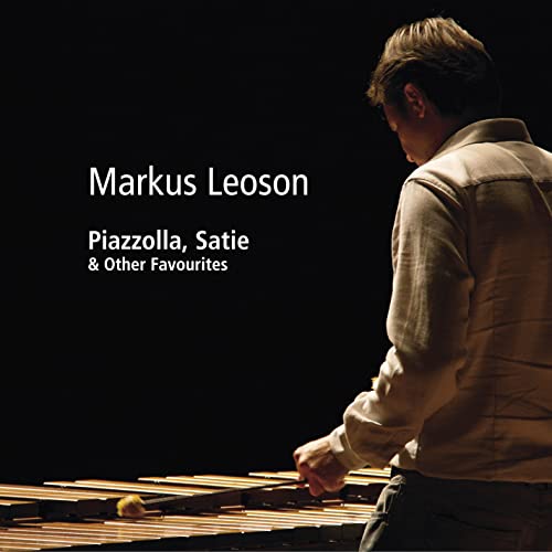 CD cover featuring pianist Markus Leoson at a marimba, dark background.