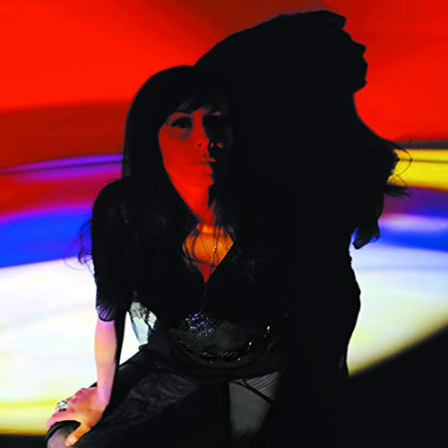 Fabienne Delsol album cover: woman in shadow with colorful lighting.