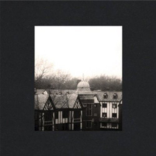 A black album cover featuring a sepia-toned image of a Tudor-style building.