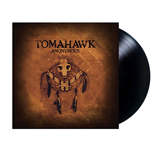 Tomahawk album cover with a dreamcatcher and vinyl record beside it.