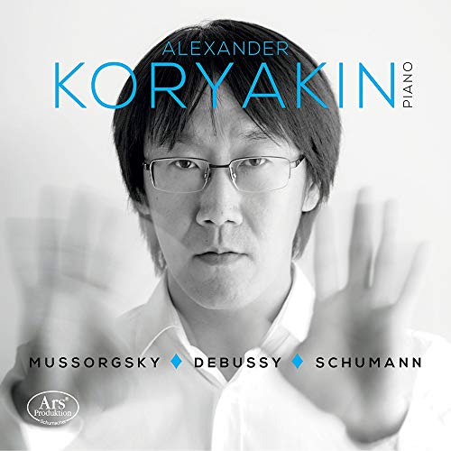 Black and white image of a man with glasses and text "Alexander Koryakin Piano" above.