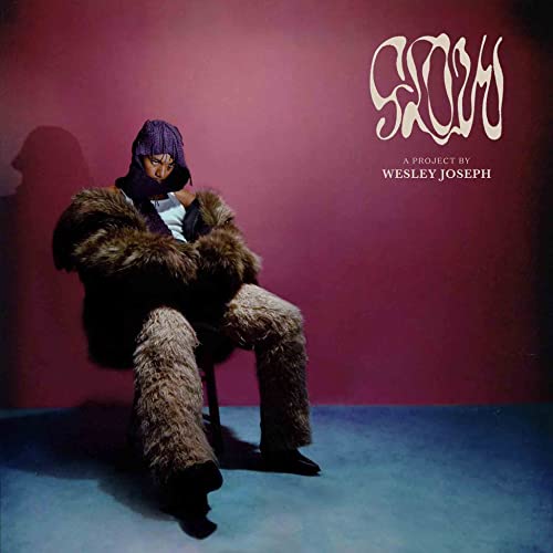 Wesley Joseph’s “Glow” EP cover: person in fur against a red background.