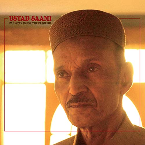 Album cover with a man wearing a cap, surrounded by a red border.